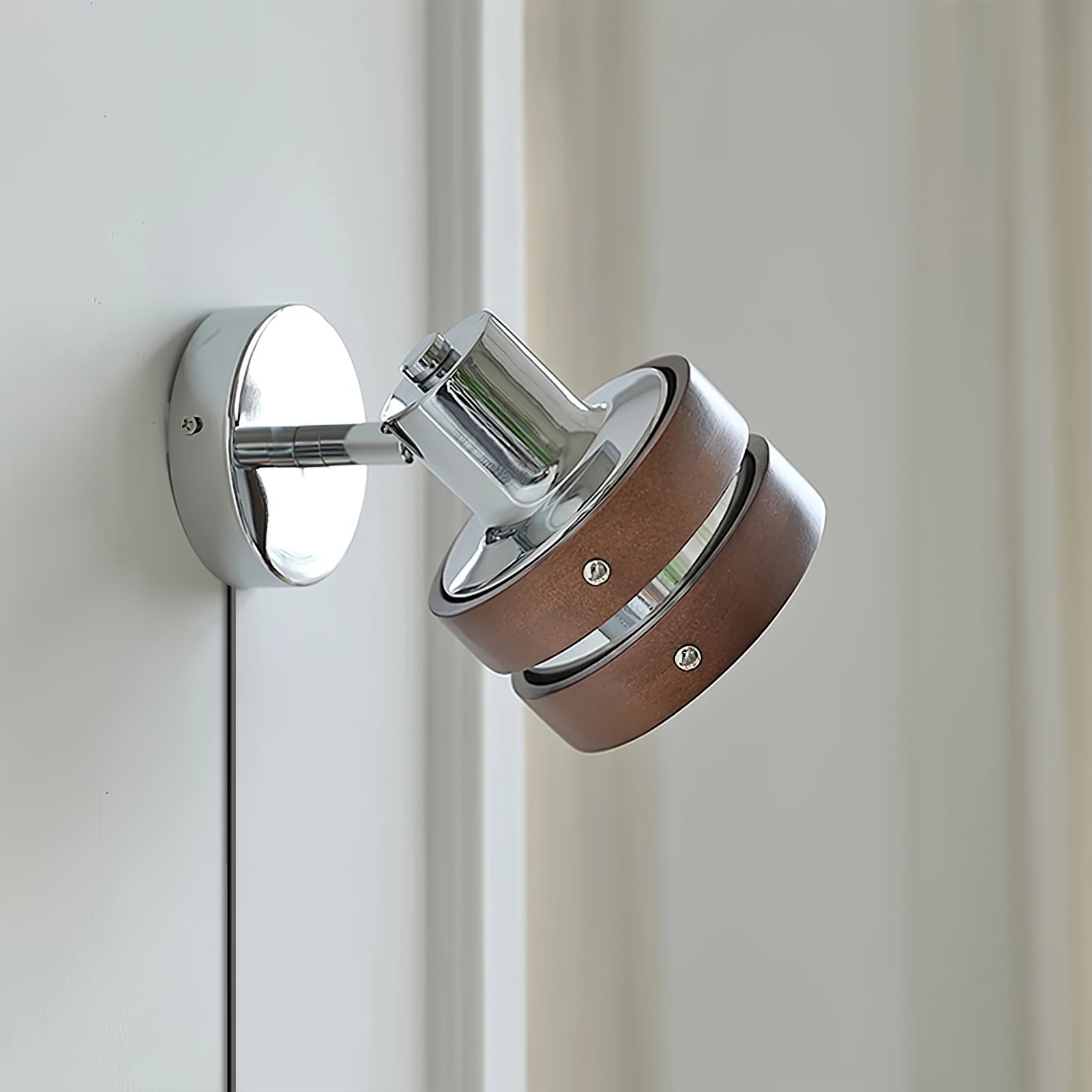 Karyon Adjustable Plug-in Wall Lamp