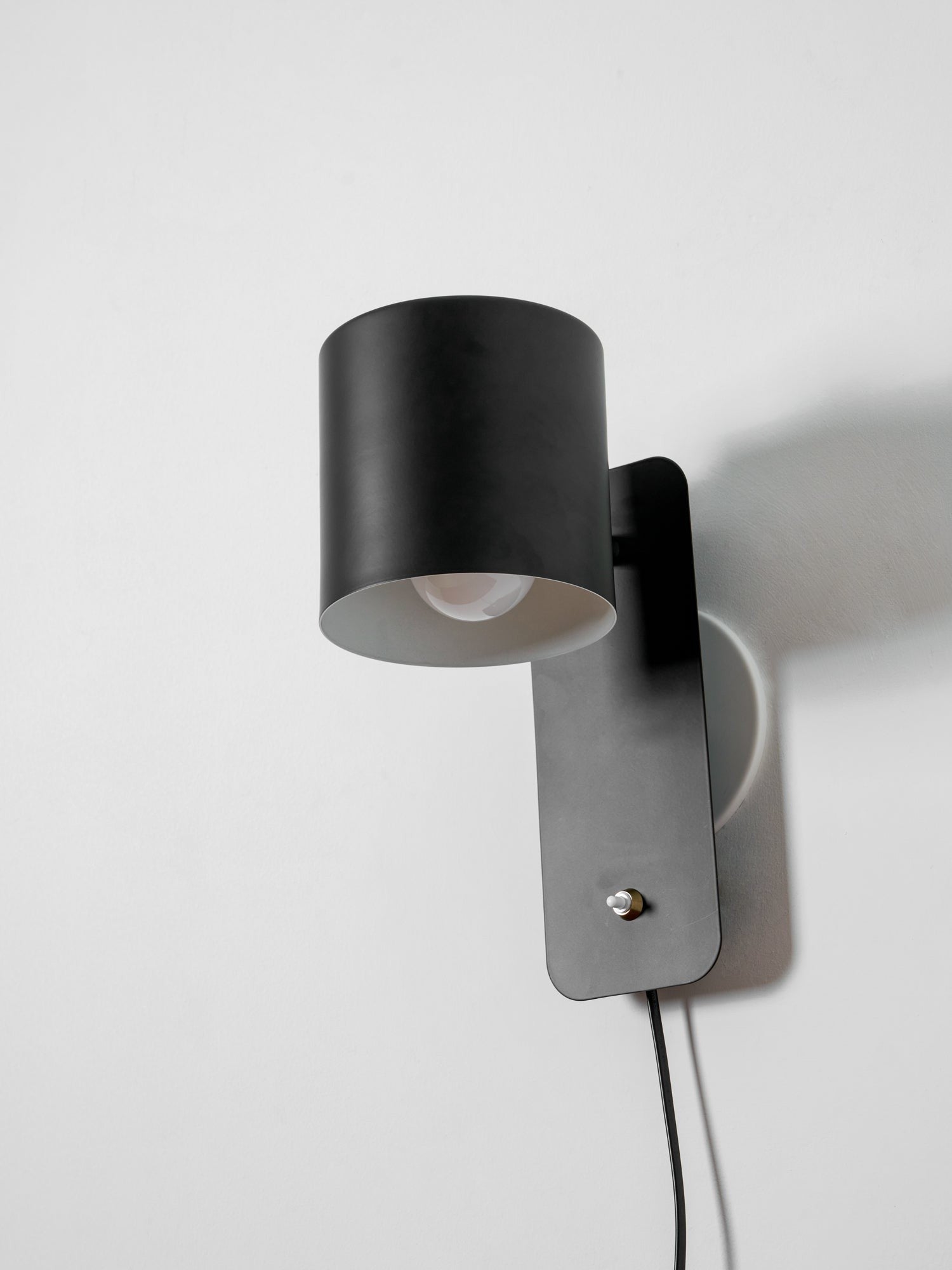 Orbitra Rotating Plug-in Wall Lamp